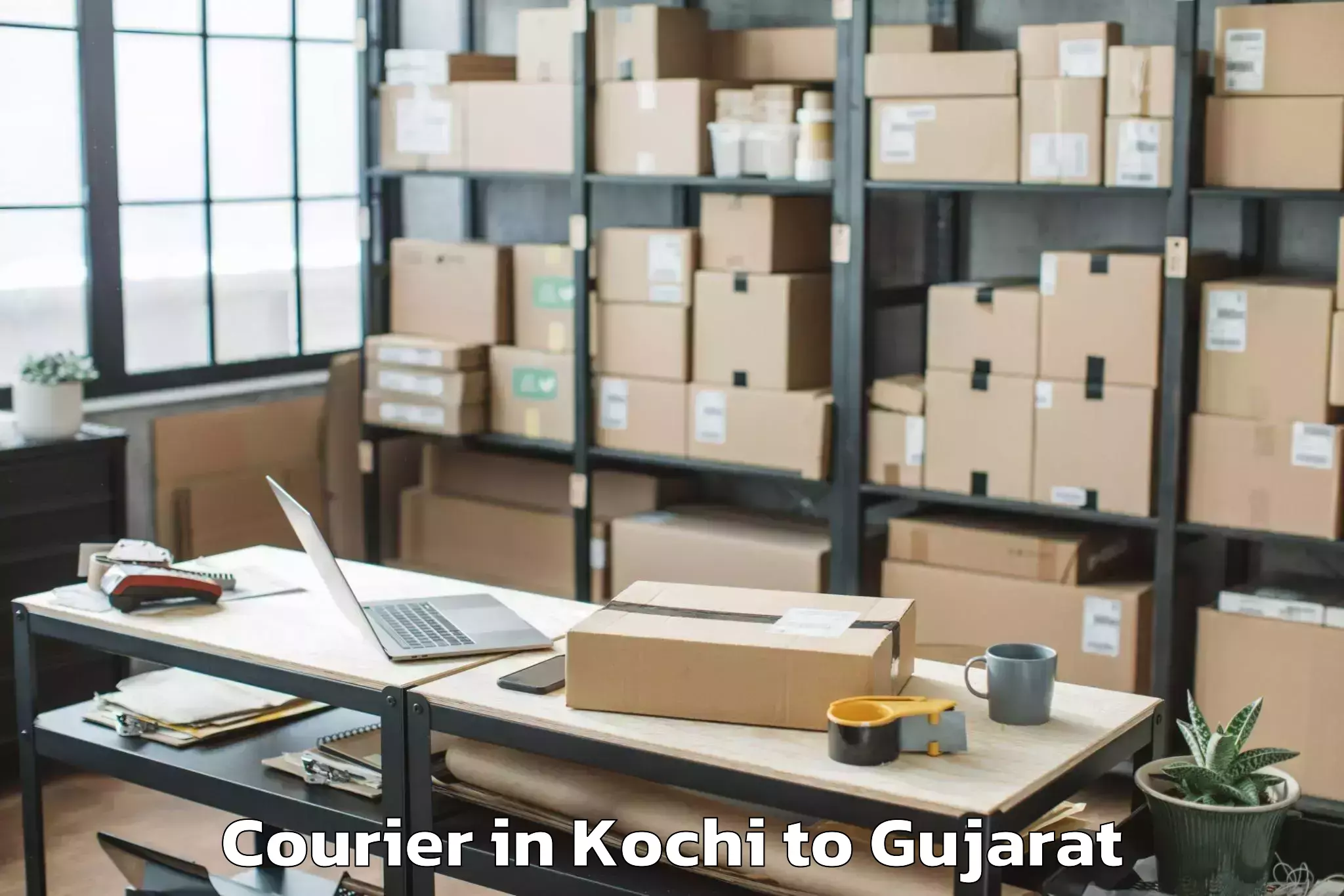 Discover Kochi to Veer Narmad South Gujarat Univ Courier